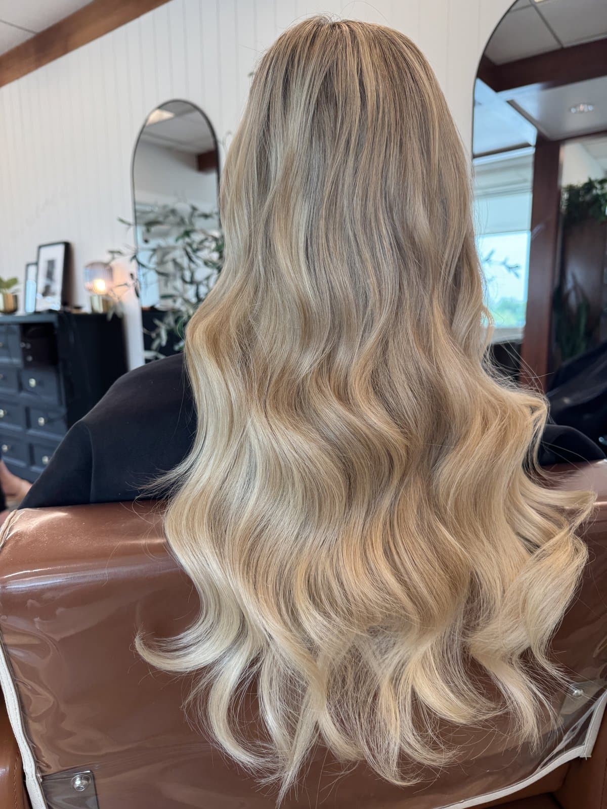 Voluminous blonde balayage extensions, overhead view